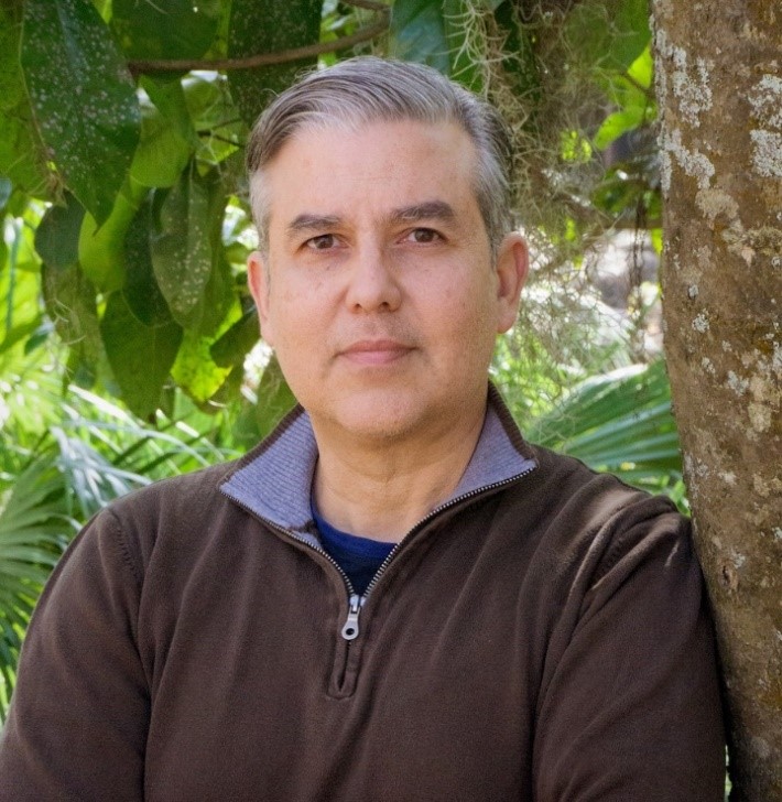 A portrait photo of a man.
