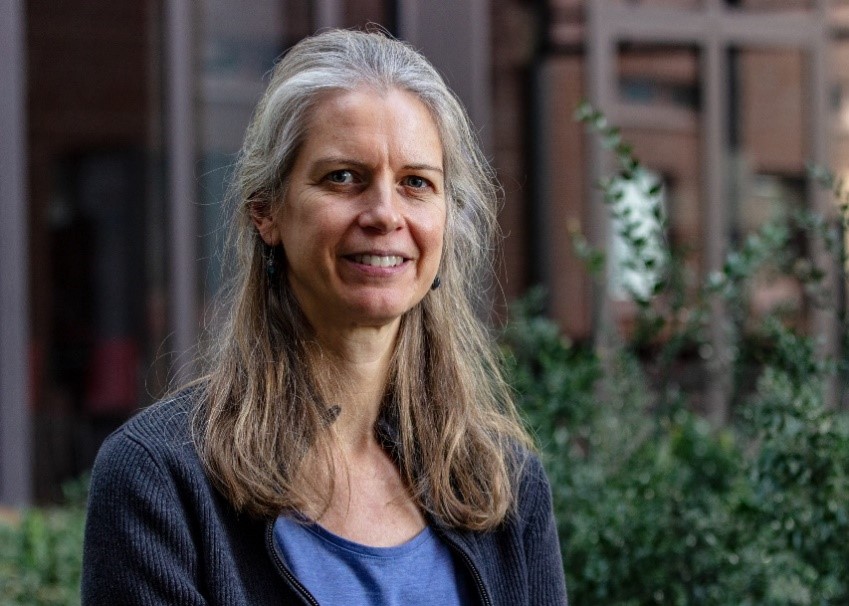 A portrait photo of a woman.
