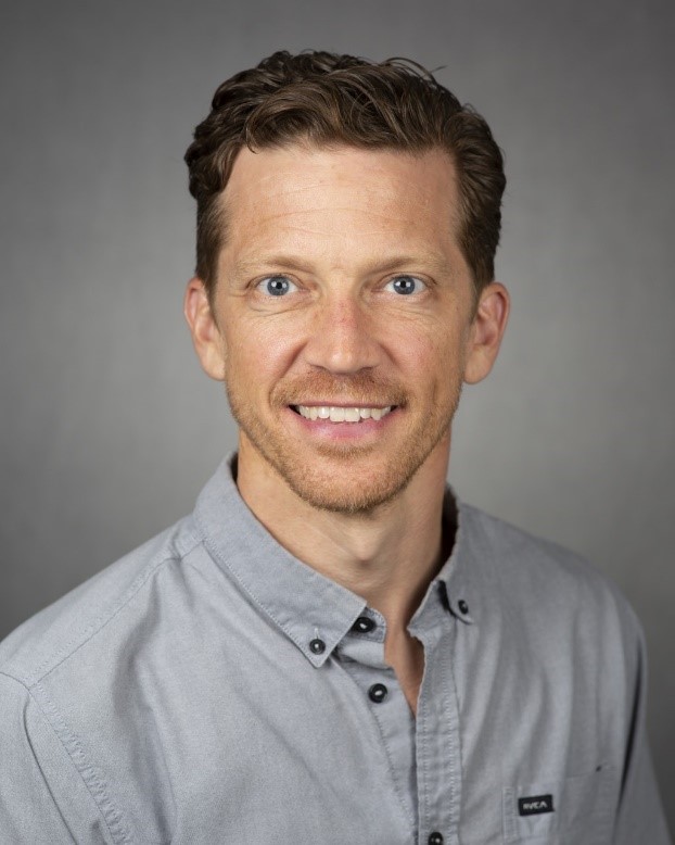 A portrait photo of a man.