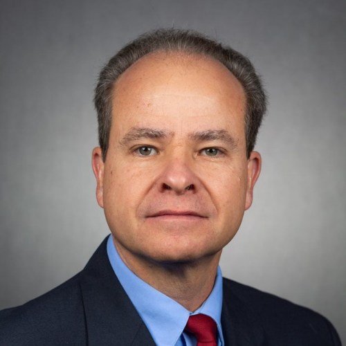 A portrait photo of a man.
